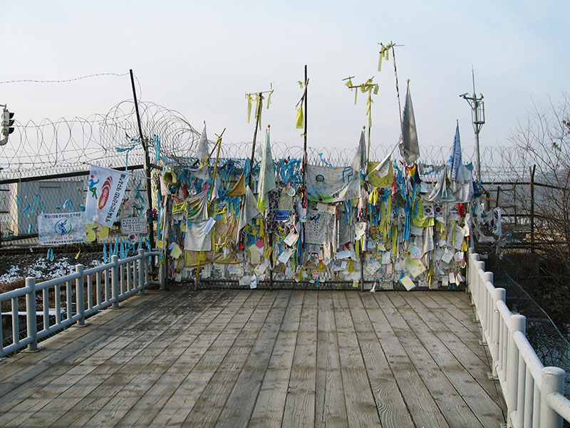 wall decorated with banners