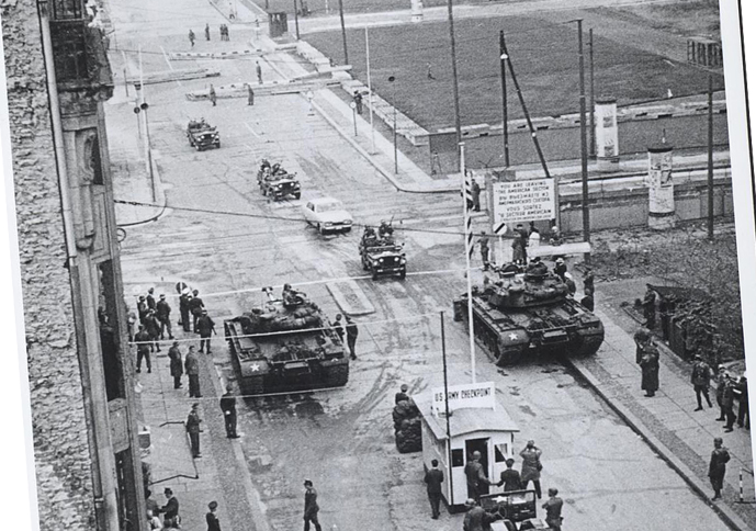 black and white photo of street with tanks