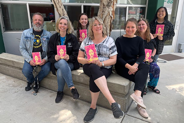 group of people with books